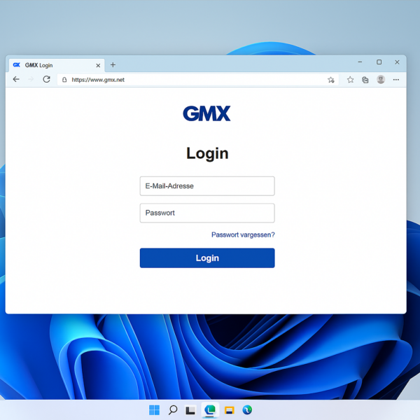 Windows 11 Desktop mit geöffnetem Browserfenster, das die GMX Login-Seite mit Eingabefeldern für E-Mail-Adresse und Passwort zeigt.