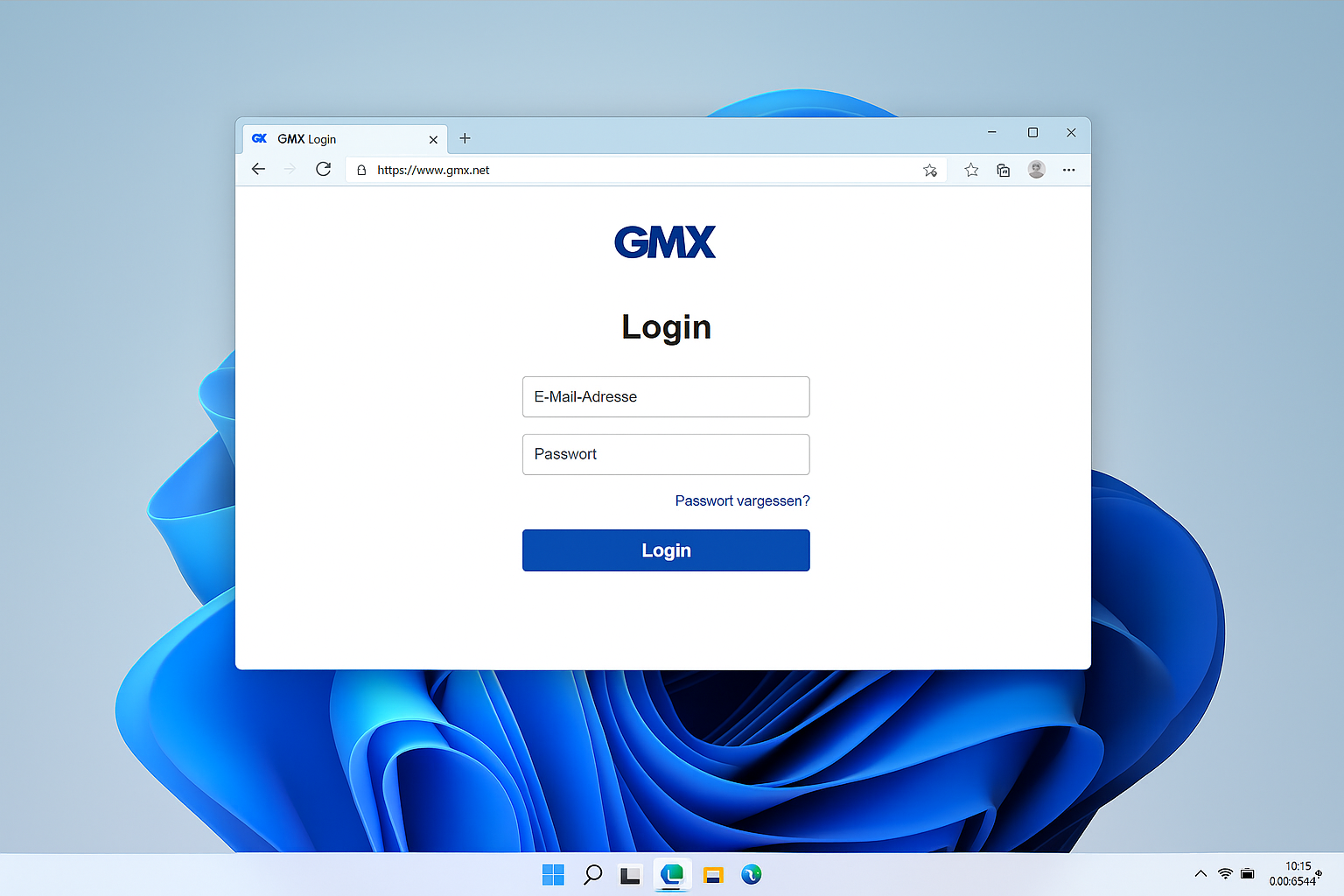 Windows 11 Desktop mit geöffnetem Browserfenster, das die GMX Login-Seite mit Eingabefeldern für E-Mail-Adresse und Passwort zeigt.